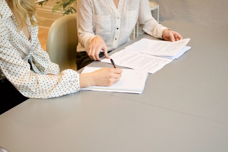 Home buyer reviewing documents during a real estate consultation