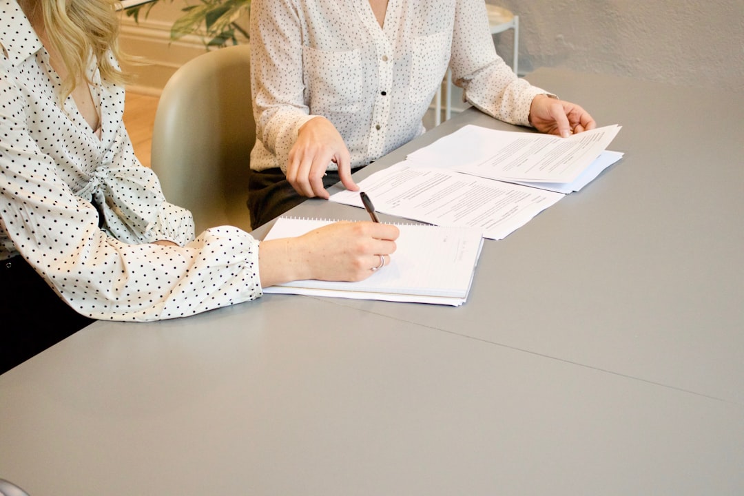 Home buyer reviewing documents during a real estate consultation