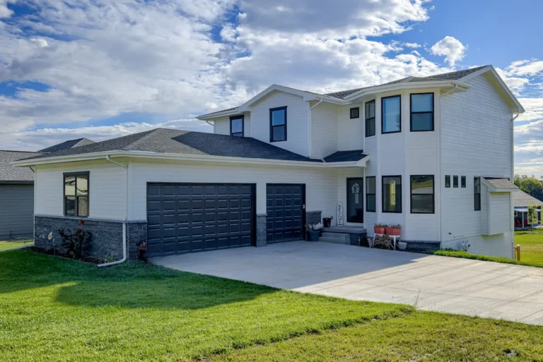 Two-story home in the Omaha metro illustrating the decision of whether to buy a home now or wait