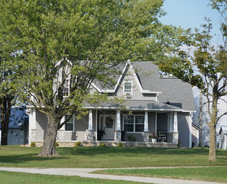 Suburban home exterior illustrating a homeowner's as-is selling decision