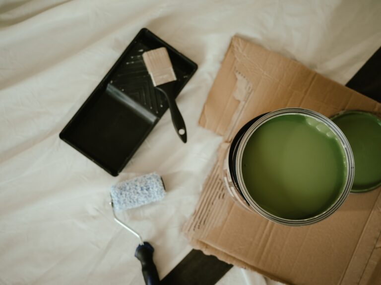 Paint and home-repair supplies illustrating targeted pre-sale fixes