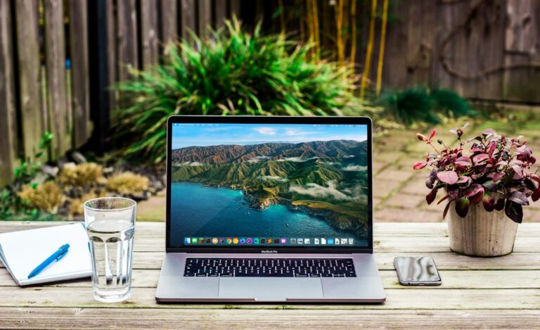 Laptop workspace illustrating an out-of-state Omaha home search