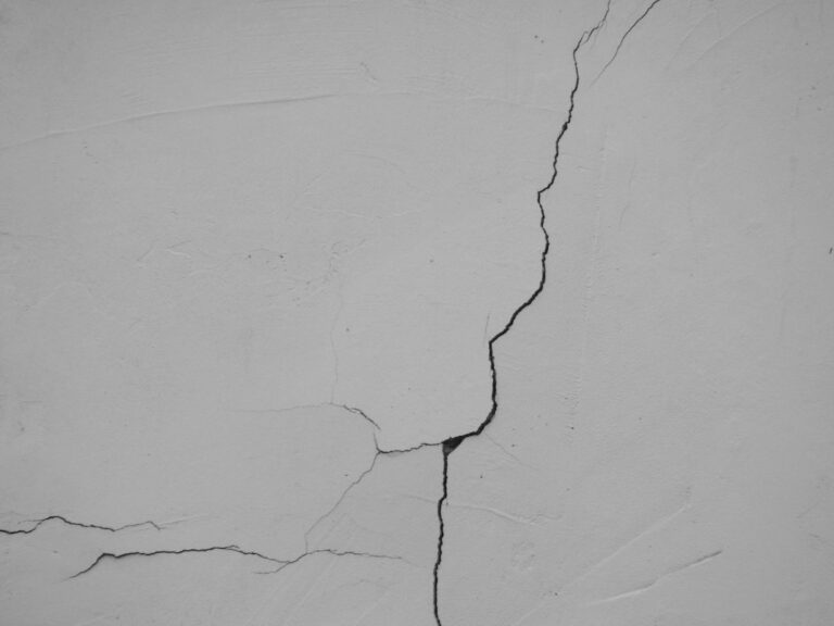 Cracked wall illustrating a home that needs major repairs before sale