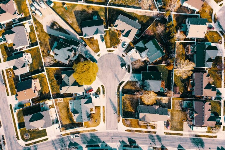 Aerial neighborhood view illustrating home prices and sales activity